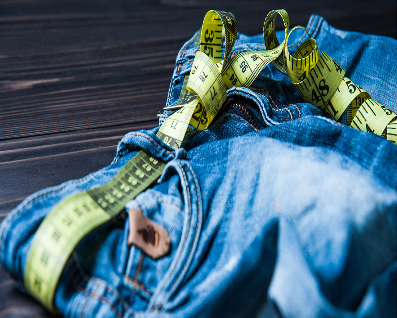 pic of jeans with a measuring belt