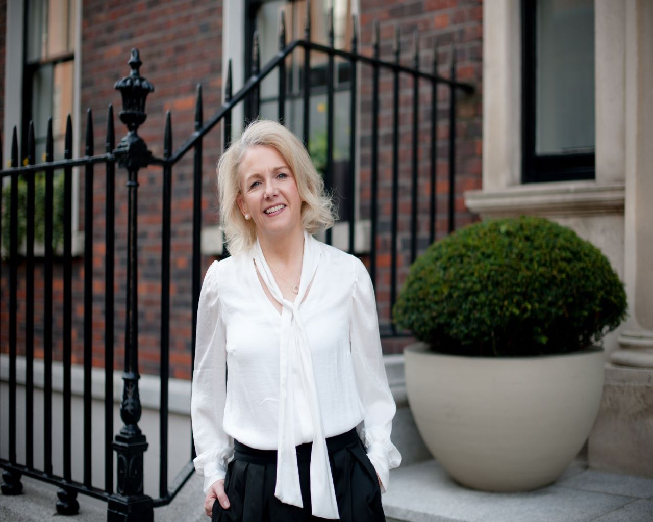 pic of team member Mary Forde outside our Dublin office