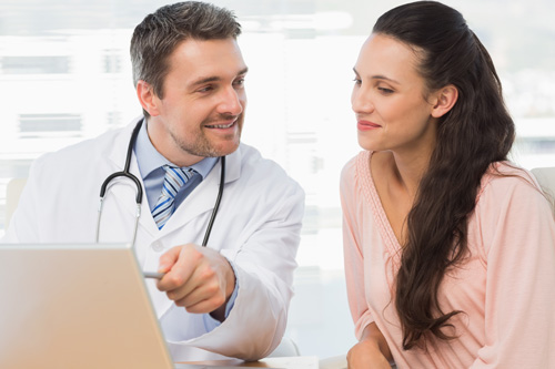 Doctor and patient sitting together