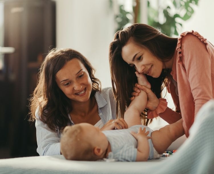 Child care woman playing with child
