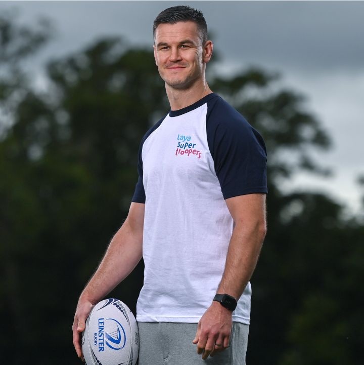 Johnny Sexton holding a rugby ball